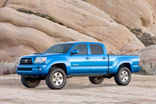 Load image into Gallery viewer, Fabtech 05-14 Toyota Tacoma 2WD/4WD 3in UCA & Dlss 2.5 C/O Sys w/Dlss Resi Rr Shks
