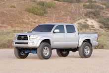 Load image into Gallery viewer, Fabtech 05-14 Toyota Tacoma 4WD/2WD 6 Lug Models 6in Perf Sys w/Dlss 2.5 C/Os & Rr Dlss