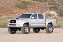 Load image into Gallery viewer, Fabtech 05-14 Toyota Tacoma 4WD/2WD 6 Lug Models 6in Perf Sys w/Dlss 2.5C/O Resi & Rr Dlss