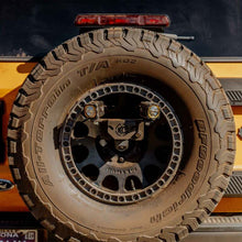 Load image into Gallery viewer, KC HiLiTES 21-24 Ford Bronco Spare Tire Carrier Light Mount w/ M12x1.5 Lug Nuts
