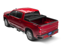 Load image into Gallery viewer, Tonno Pro 05-19 Nissan Frontier 5ft Styleside Hard Fold Tonneau Cover

