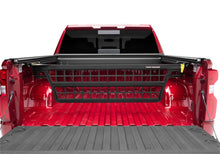 Load image into Gallery viewer, Roll-N-Lock 09-17 Dodge Ram RamBox XSB 67in Cargo Manager
